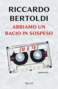 Book Cover: Abbiamo un bacio in sospeso (io e te) di Riccardo Bertoldi